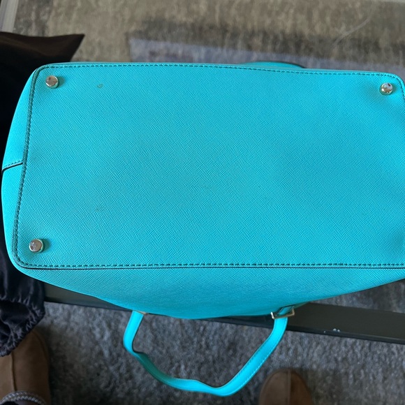 Kate spade tote with inside zipper pocket and two pockets on other side. - Picture 8 of 14